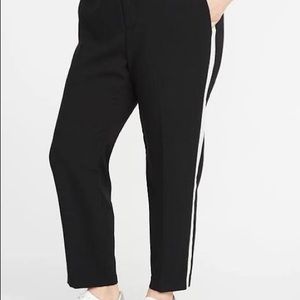 Black trousers with white stripe down side